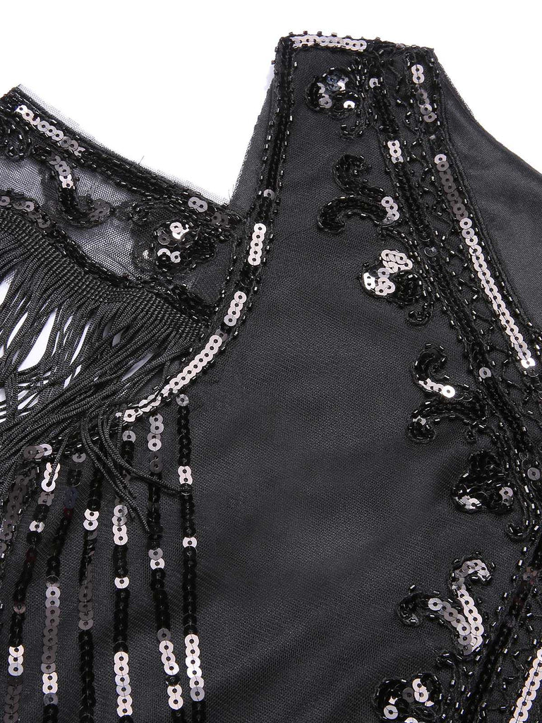 This 1920s Cold Shoulder Embroidered Fringe Sequins Dress wraps her in 1920s elegance, one twirl at a time
