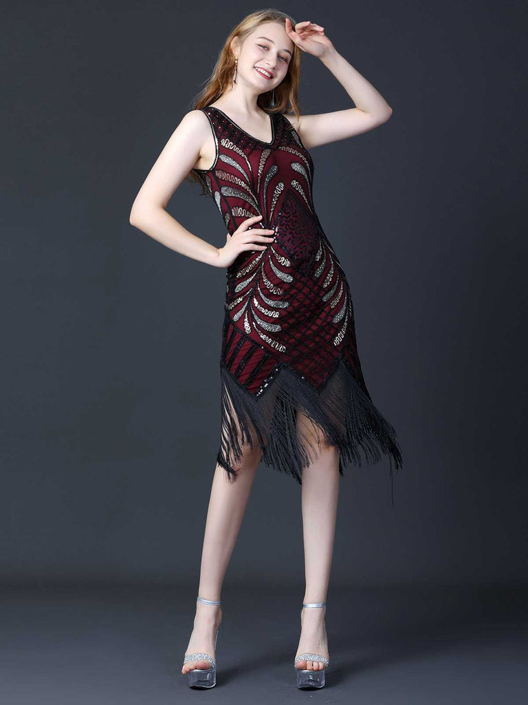 This 1920s Sequined Fringe Flapper Sleeveless Dress wraps her in 1920s elegance, one twirl at a time