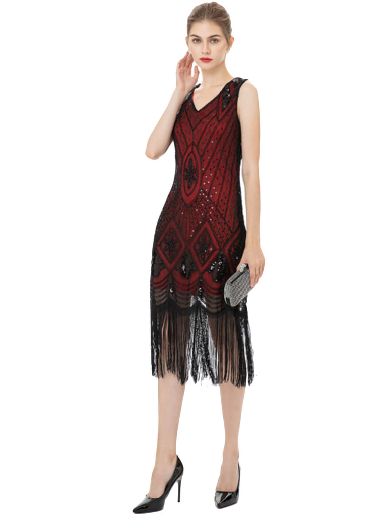 This 1920s Sequined Tassel Charleston Dress wraps her in 1920s elegance, one twirl at a time