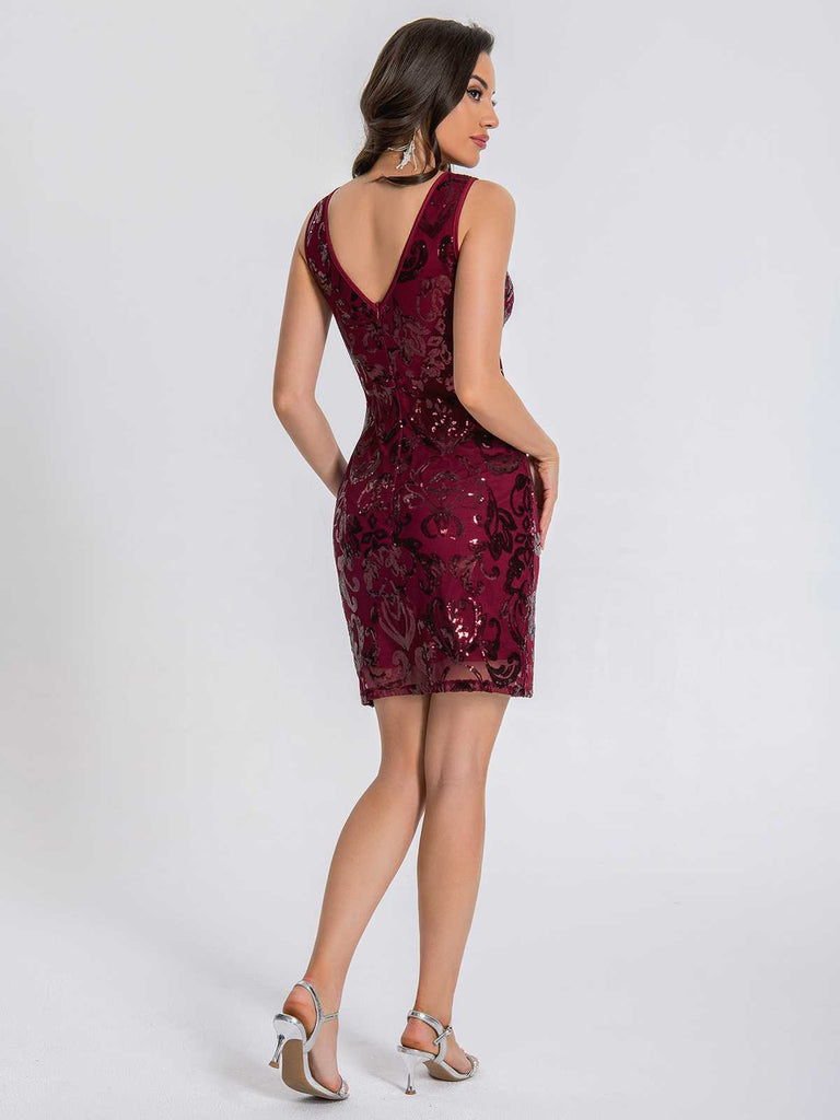 This 1920s Sheer Neckline Floral Pattern Sequin Dress wraps her in 1920s elegance, one twirl at a time