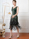 This 1920s V-Neck Sequined Tassel Flapper Sleeveless Dress wraps her in 1920s elegance, one twirl at a time
