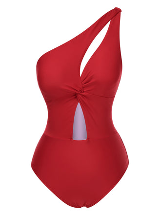 She's wearing 1930s One-Shoulder Cut-Out Solid One-Piece Swimsuit and the whole beach remembers the 1930s