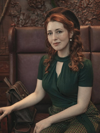 She adds this 1930s Plaid Keyhole Neck Belted Jumpsuit and suddenly it's 1930s perfection