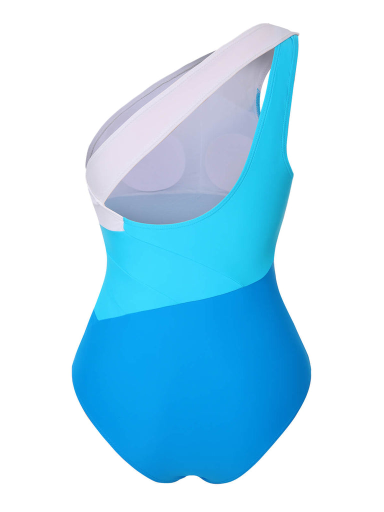 She's wearing 1940s Color Block One Shoulder One-Piece Swimsuit and the whole beach remembers the 1940s
