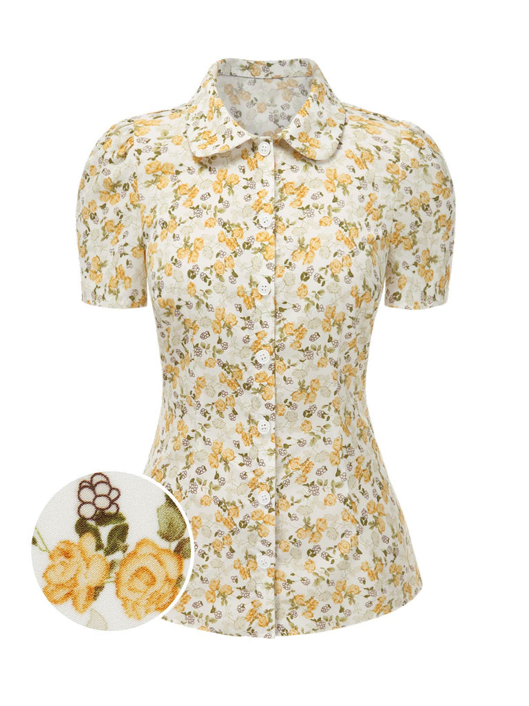 She pairs this 1940s Peter Pan Collar Ditsy Floral Blouse with confidence and 1940s charm