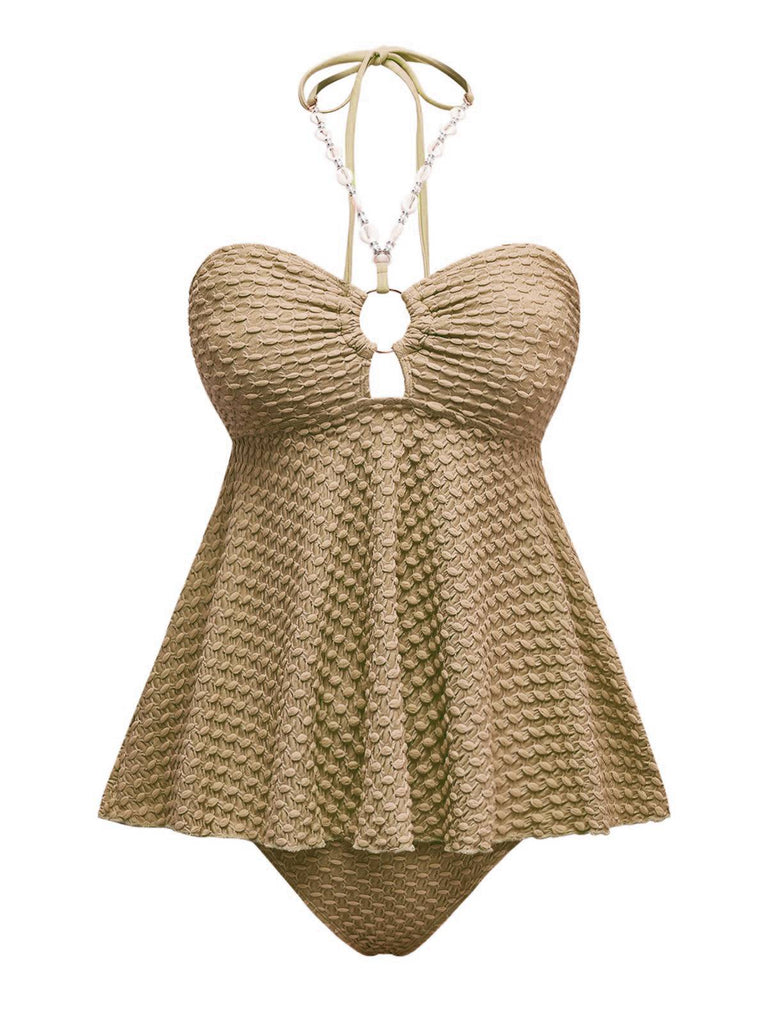 This 1940s Seashell Chain Lace-Up Halter Swimsuit carries 1940s vacation dreams in every stitch