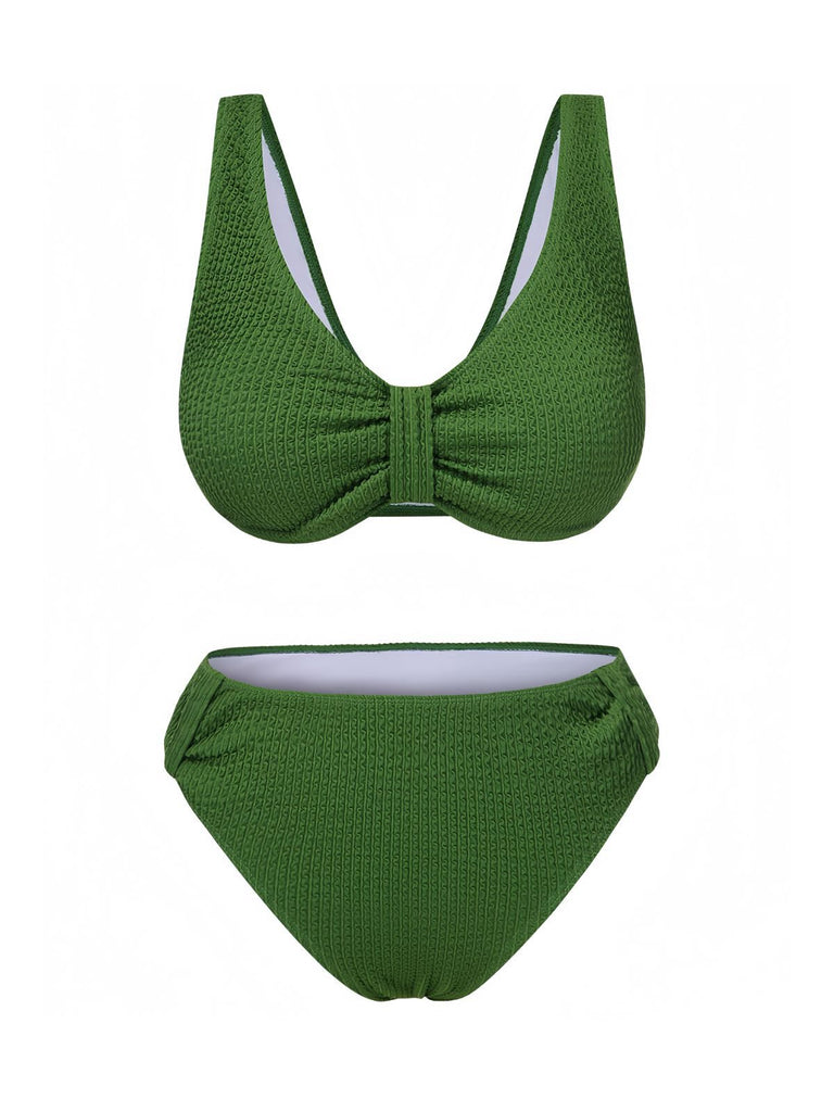 She's wearing 1940s Solid Bowknot Textured Fabric Swimsuit and the whole beach remembers the 1940s