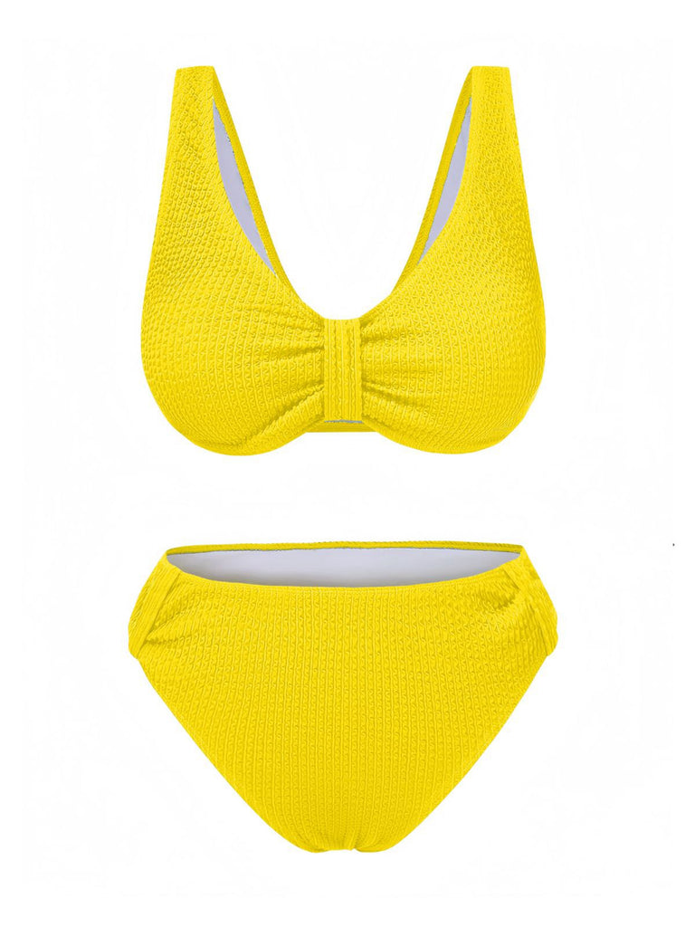 This 1940s Solid Bowknot Textured Fabric Swimsuit carries 1940s vacation dreams in every stitch