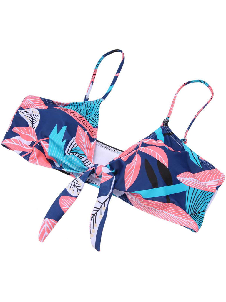 She's wearing 1940s Spaghetti Strap Print Swimsuit & Cover-Up and the whole beach remembers the 1940s