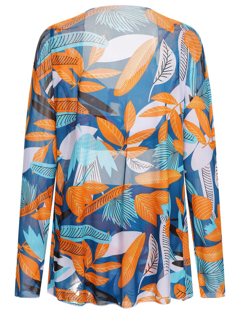 She's wearing 1940s Spaghetti Strap Print Swimsuit & Cover-Up and the whole beach remembers the 1940s