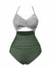 This 1940s Stripe Patchwork Hollow One-Piece Swimsuit carries 1940s vacation dreams in every stitch