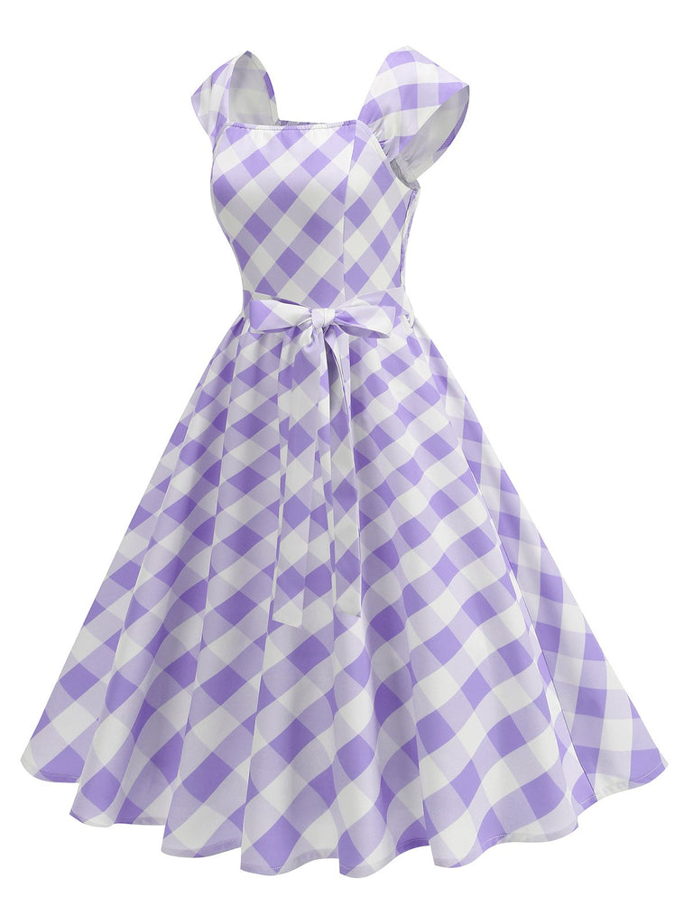 She slips into this 1950s Cap Sleeves Argyle Plaid Swing Dress and suddenly it's a 1950s daydream