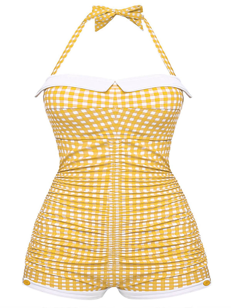 She's wearing 1950s Check Halter Bowknot One-piece Swimsuit and the whole beach remembers the 1950s
