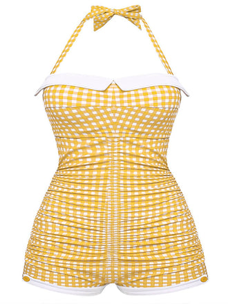 She's wearing 1950s Check Halter Bowknot One-piece Swimsuit and the whole beach remembers the 1950s
