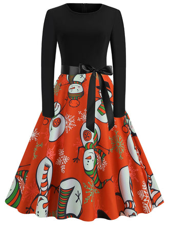 She slips into this 1950s Christmas Crew Neck Patchwork Swing Dress and suddenly it's a 1950s daydream
