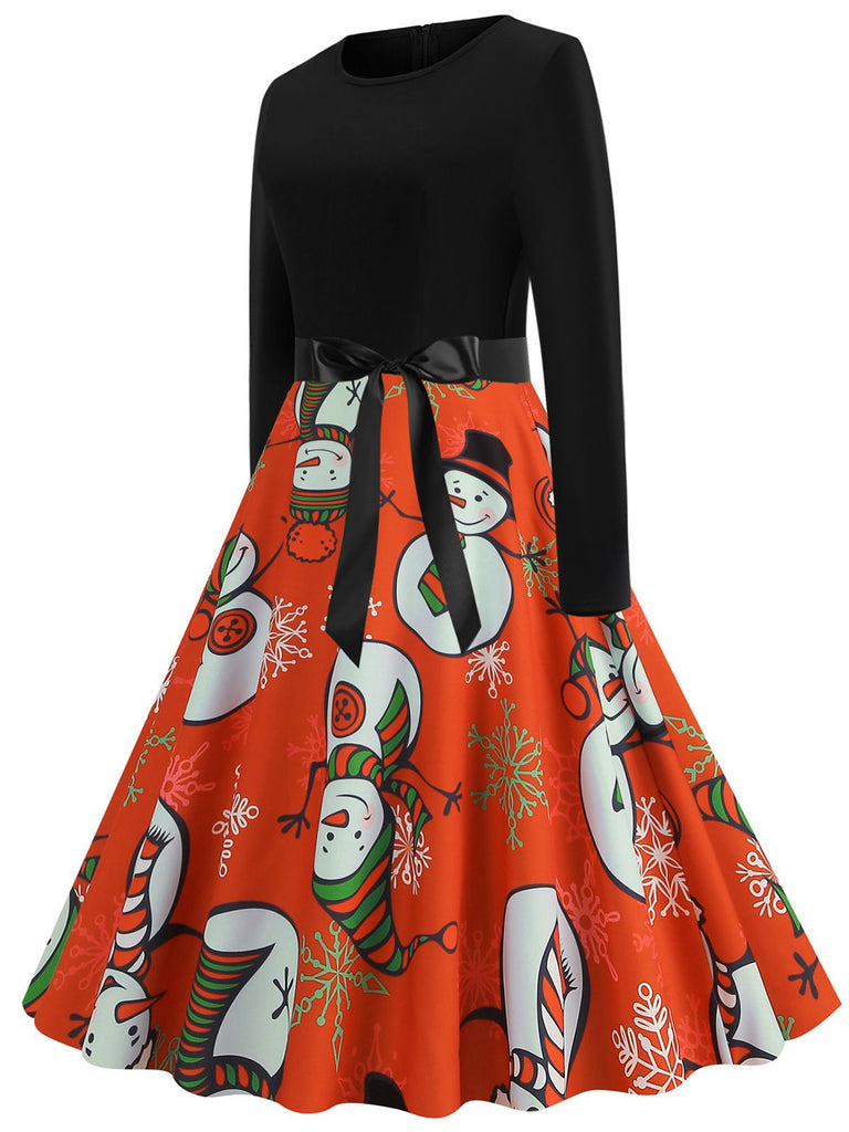 This 1950s Christmas Crew Neck Patchwork Swing Dress wraps her in 1950s elegance, one twirl at a time