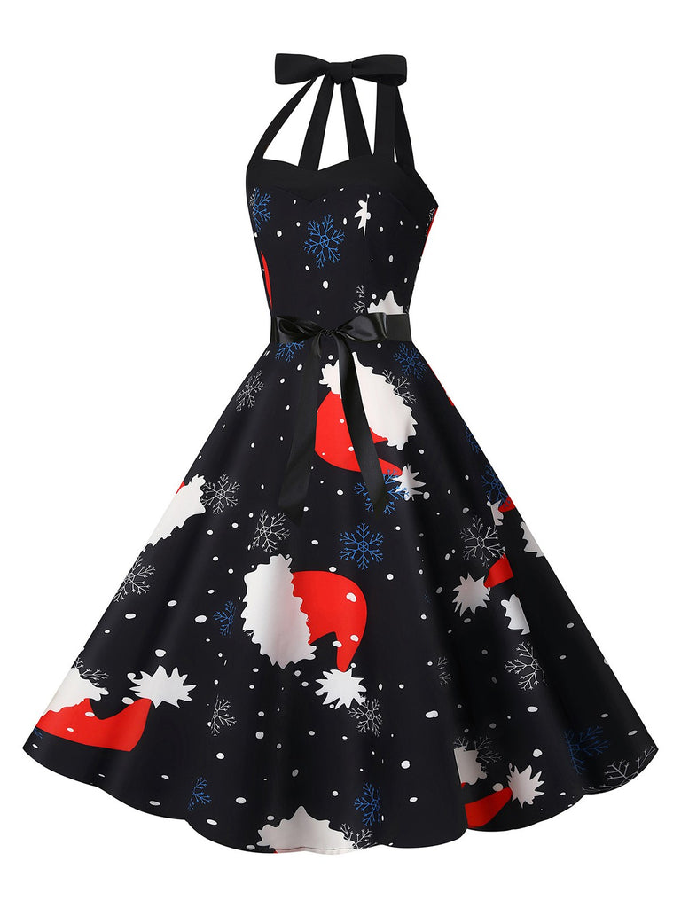 She slips into this 1950s Christmas Halter Belted Swing Dress and suddenly it's a 1950s daydream