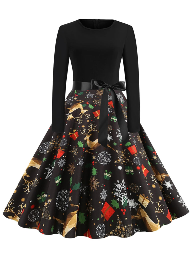 She slips into this 1950s Christmas Print Belted Dress and suddenly it's a 1950s daydream