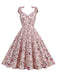 She slips into this 1950s Ditsy Floral Tie Swing Dress and suddenly it's a 1950s daydream