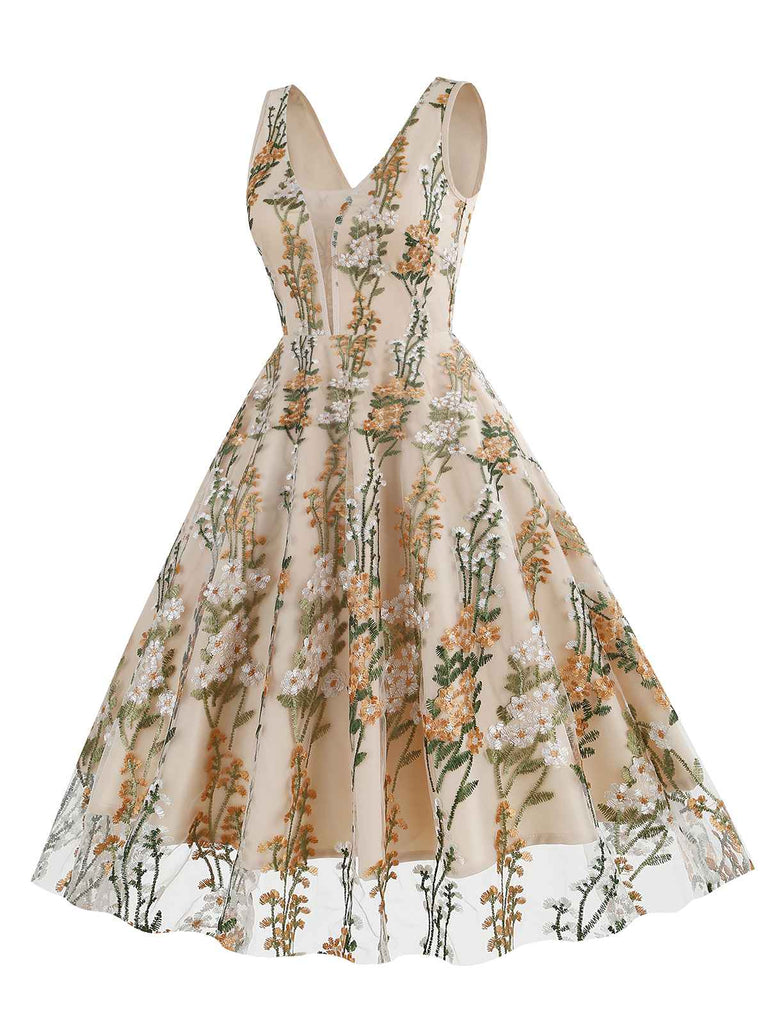 She slips into this 1950s Embroidered Floral V-Neck Swing Dress and suddenly it's a 1950s daydream