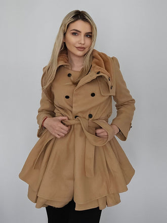 She throws on this 1950s Fur Collar Waisted Winter Coat and the city feels like 1950s Paris