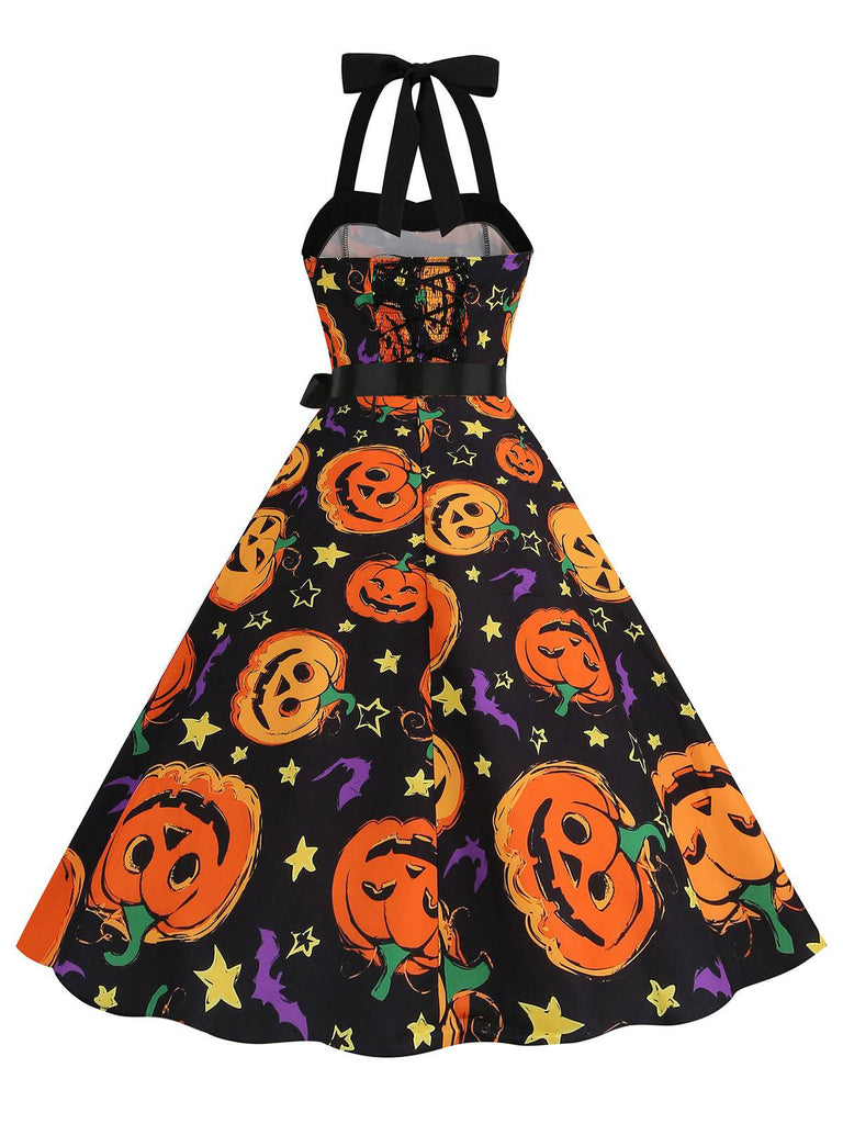 She slips into this 1950s Halloween Pumpkin Face Halter Dress and suddenly it's a 1950s daydream