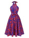She slips into this 1950s Halter Abstract Print Backless Swing Dress and suddenly it's a 1950s daydream