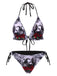 She's wearing 1950s Halter Gothic Skull Roses Swimsuit and the whole beach remembers the 1950s
