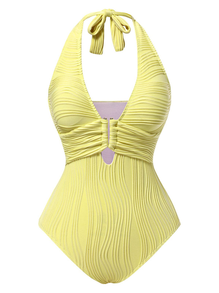 She's wearing 1950s Halter Hollow U-Ring Textured 