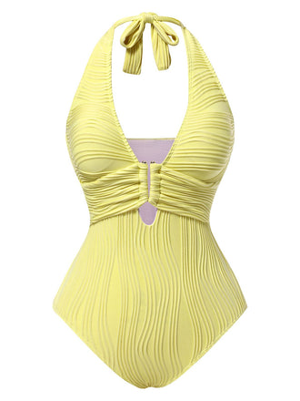 She's wearing 1950s Halter Hollow U-Ring Textured 