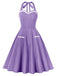 This 1950s Halter Pockets Backless Swing Dress wraps her in 1950s elegance, one twirl at a time