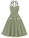 She slips into this 1950s Halter Pockets Backless Swing Dress and suddenly it's a 1950s daydream