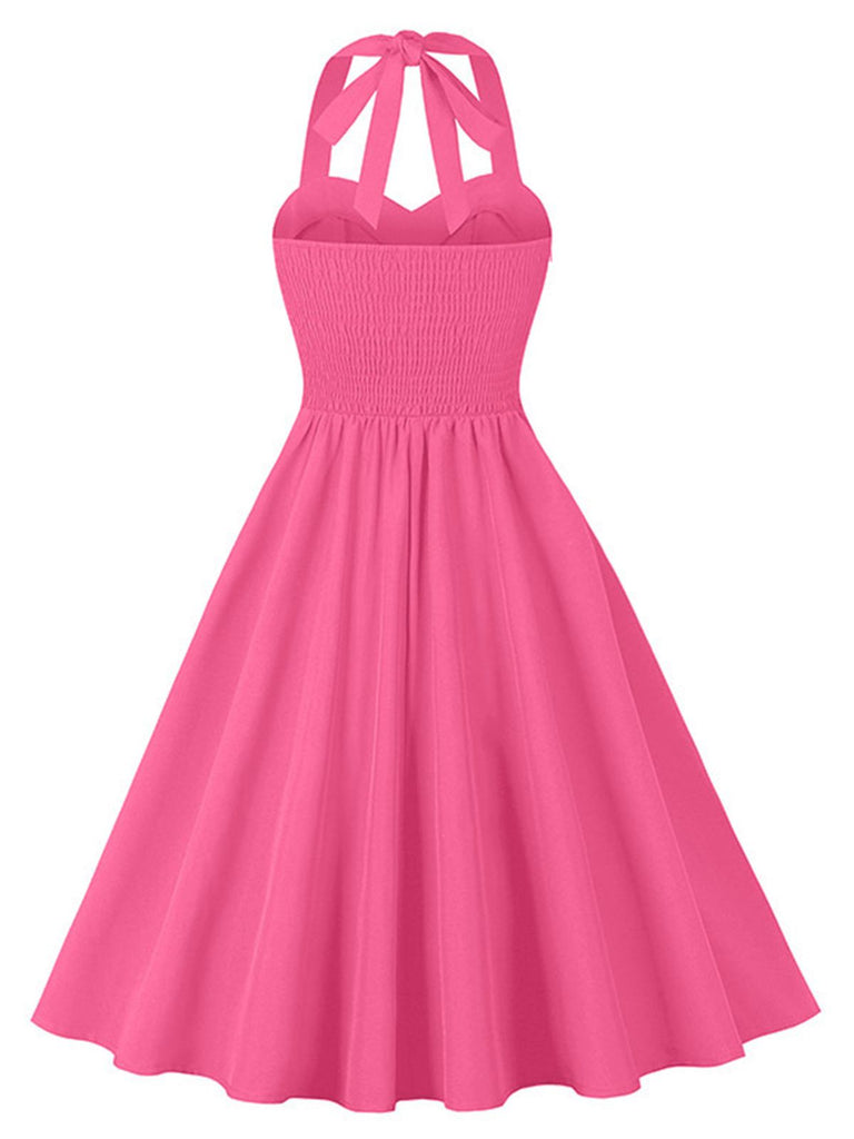 This 1950s Halter Pockets Backless Swing Dress wraps her in 1950s elegance, one twirl at a time