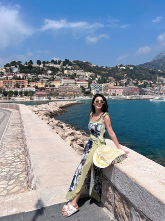 She's wearing 1950s Ink Floral Halter One-Piece Swimsuit and the whole beach remembers the 1950s