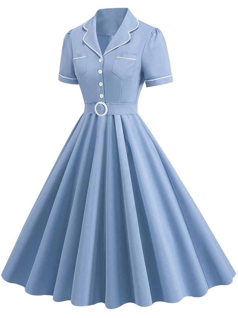 She slips into this 1950s Lapel Belted Solid Dress and suddenly it's a 1950s daydream