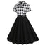 This 1950s Lapel Contrast Belted Dress wraps her in 1950s elegance, one twirl at a time