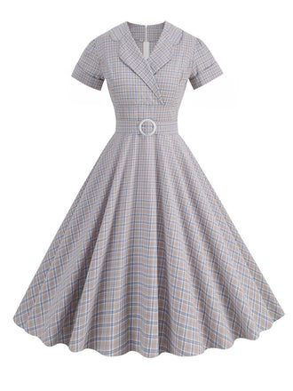 She slips into this 1950s Lapel Plaids Belted Dress and suddenly it's a 1950s daydream