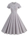 She slips into this 1950s Lapel Plaids Belted Dress and suddenly it's a 1950s daydream