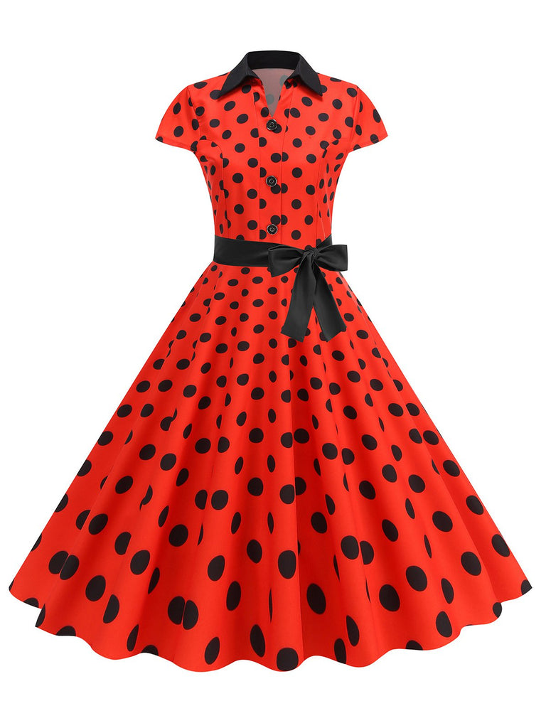 She slips into this 1950s Lapel Polka Dots Bow Swing Dress and suddenly it's a 1950s daydream