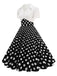 She slips into this 1950s Lapel Polka Dots Patchwork Swing Dress and suddenly it's a 1950s daydream