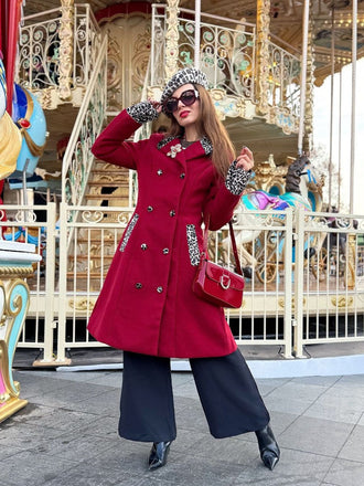 She throws on this 1950s Leopard Patchwork Button Coat and the city feels like 1950s Paris