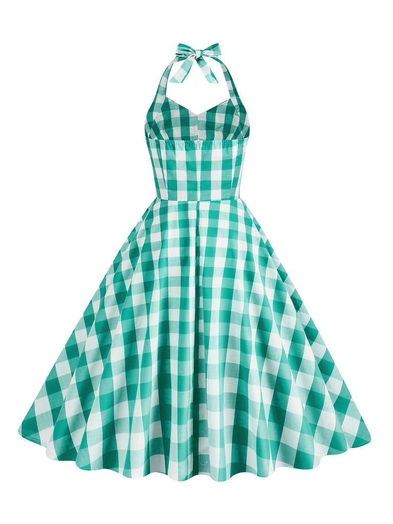 She slips into this 1950s Plaid Halter Swing Dress and suddenly it's a 1950s daydream
