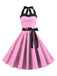 She slips into this 1950s Polka Dot Bow Tie Halter Swing Dress and suddenly it's a 1950s daydream