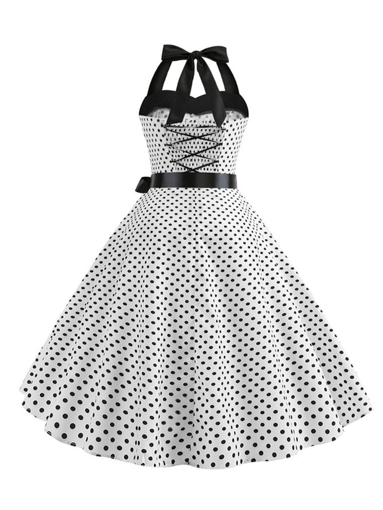 1950s Polka Dot Bow Tie Halter Swing Dress — the kind of 1950s dress that makes strangers smile
