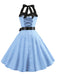 This 1950s Polka Dot Bow Tie Halter Swing Dress wraps her in 1950s elegance, one twirl at a time