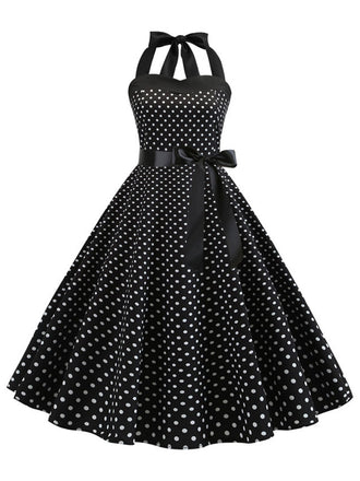 1950s Polka Dot Bow Tie Halter Swing Dress — a 1950s silhouette that turns sidewalks into runways