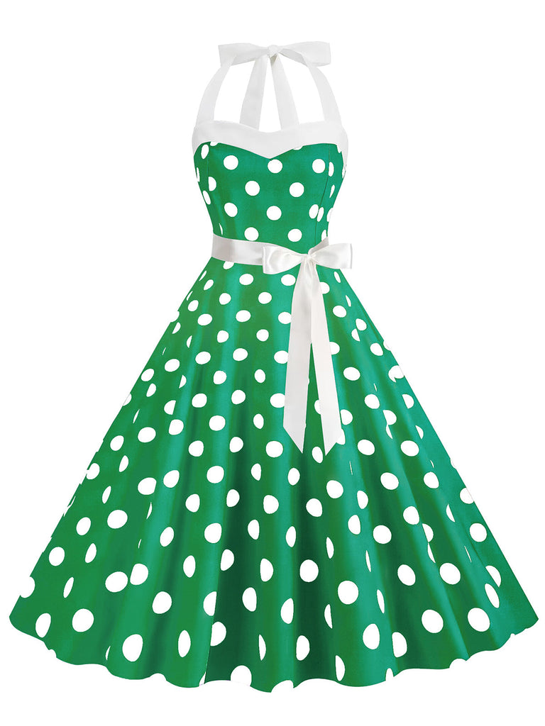 She slips into this 1950s Polka Dot Halter Belt Swing Dress and suddenly it's a 1950s daydream
