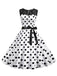 She slips into this 1950s Polka Dot Lace Patchwork Dress and suddenly it's a 1950s daydream