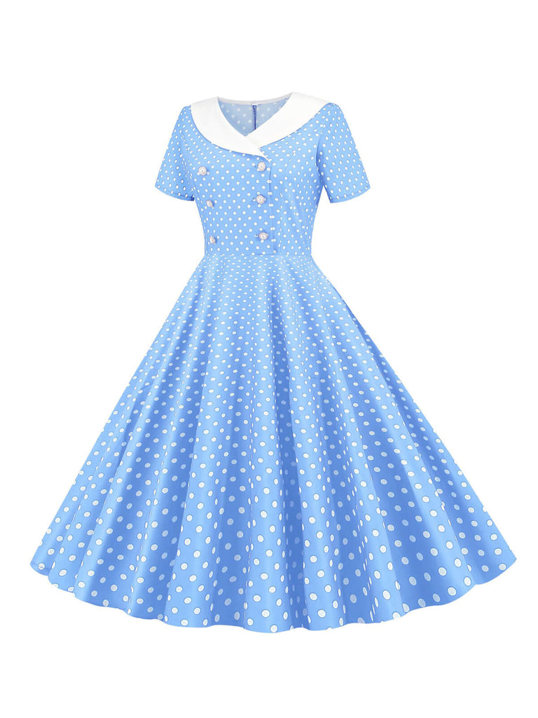 She slips into this 1950s Polka Dot Patchwork Lapel Dress and suddenly it's a 1950s daydream