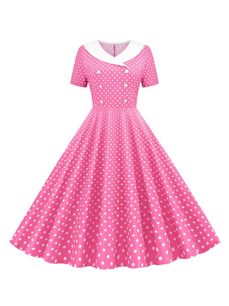 She slips into this 1950s Polka Dot Patchwork Lapel Dress and suddenly it's a 1950s daydream